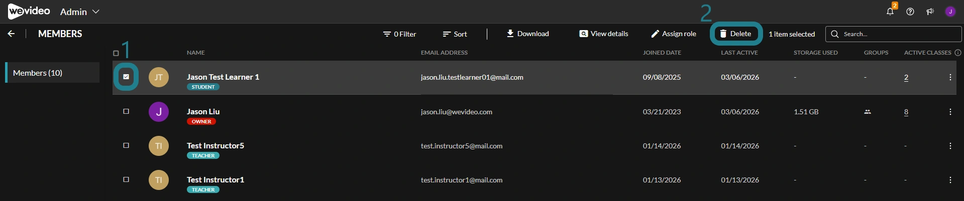 Select the users by clicking the checkboxes next to their names, and click the Delete button at the top.